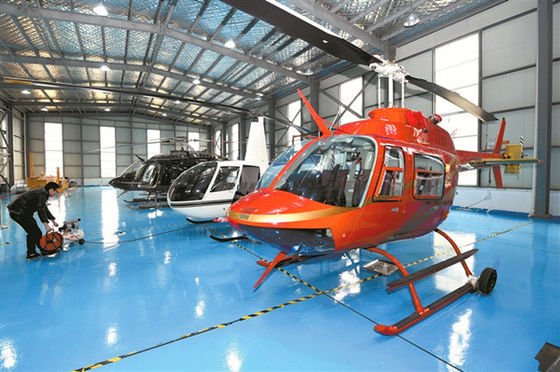Hangar per elicotteri con struttura in acciaio e isolamento in lana di vetro